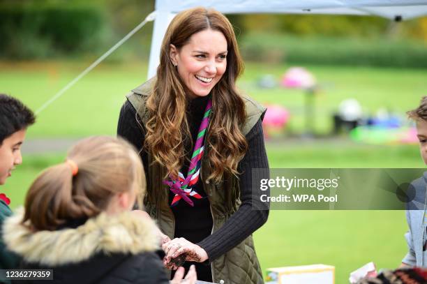 Prince William, Duke of Cambridge and Catherine, Duchess of Cambridge help the 105th Glasgow Scouts celebrate the Scout Assocations...