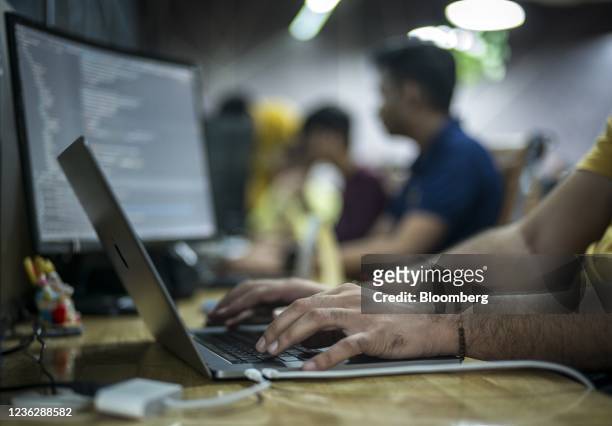 BharatPe employees work at the company's headquarters in New Delhi, India, on Tuesday, Oct. 5, 2021. As online payments and digital loans in the...
