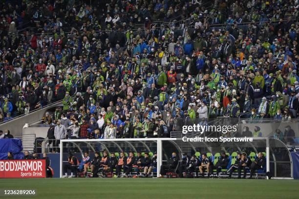 Seattle Sounder fans look on from behind the Sounders bench during an MLS match between the LA Galaxy and the Seattle Sounders on November 1, 2021 at...