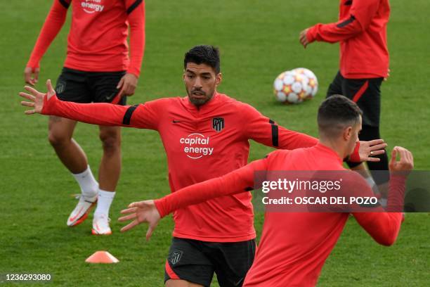 Atletico Madrid's Uruguayan forward Luis Suarez takes part in a training session at the Ciudad Deportiva Wanda training ground in Madrid on November...