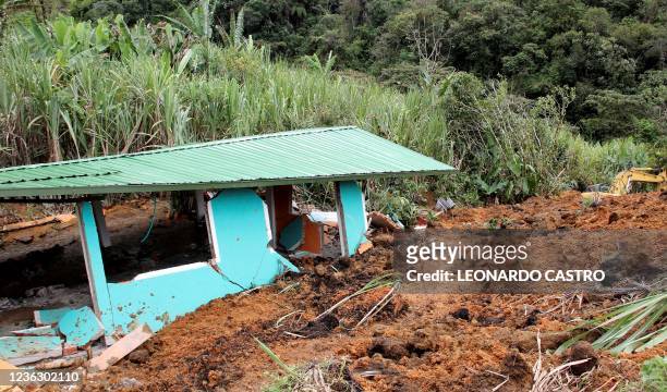 View of damages after a mudslide buried two houses in Mallama, Narino province, Colombia, on November 2, 2021. - At least 4 people died and several...