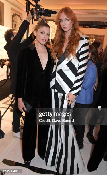 Valentina Sampaio and Harris Reed attend the Harper's Bazaar Women of the Year Awards 2021, in partnership with Armani Beauty, at Claridge's Hotel on...