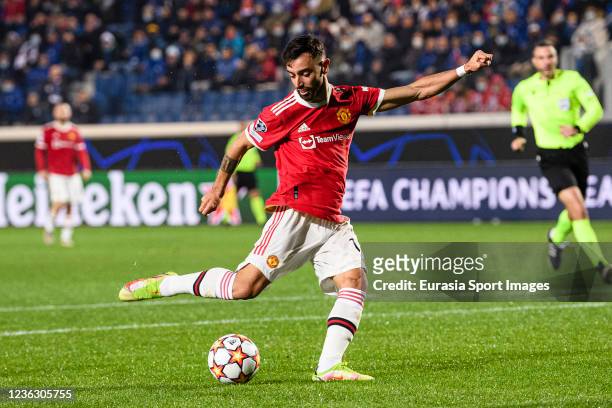 Bruno Fernandes of Manchester United attempts a kick during the UEFA Champions League group F match between Atalanta and Manchester United at Stadio...