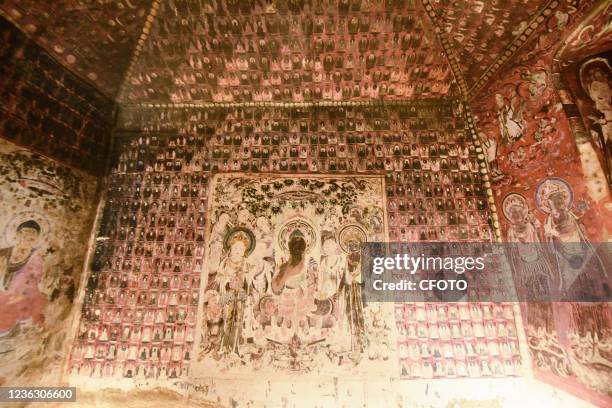 Photo taken on Nov 2, 2021 shows the 3D digital printing and restoration technology of the mural in Cave 57 of Dunhuang Mogao Grottoes at the Museum...