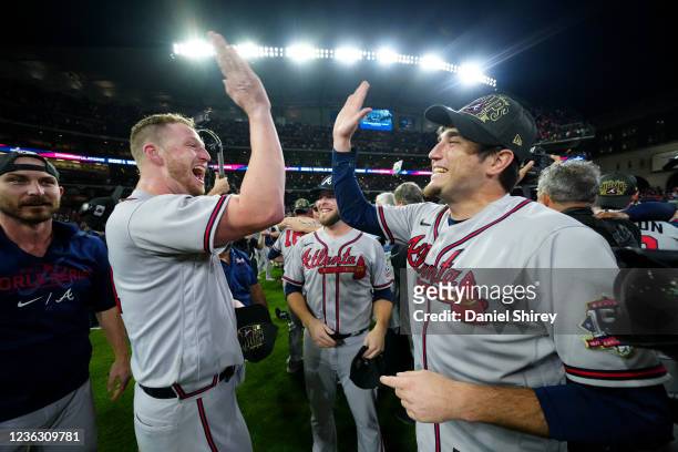 Will Smith and Luke Jackson of the Atlanta Braves celebrate on the field after the Braves defeated the Houston Astros in Game 6 to clinch the 2021...