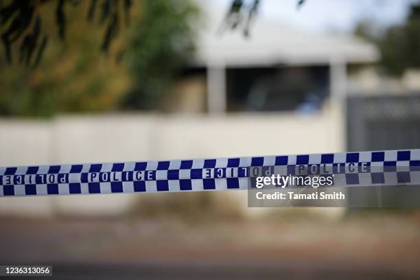 Police line is seen outside a house where four-year-old Cleo Smith was found on November 3, 2021 in Carnarvon, Australia. Cleo Smith was found in the...