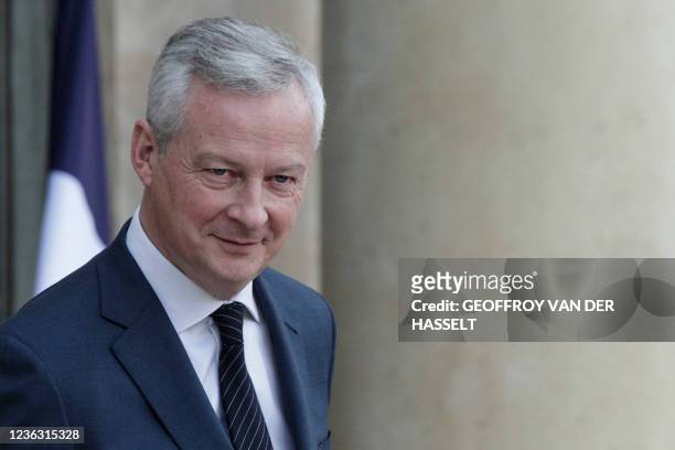 French Economy and Finance Minister Bruno Le Maire reacts as he leaves the Elysee Presidential Palace after a weekly cabinet meeting on November 3,...