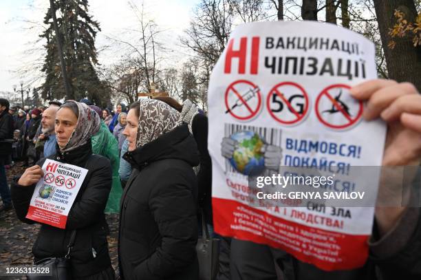 Anti-vaxxers protesters stage a protest against the Covid quarantine restrictions, outside the Ukrainian parliament in Kiev on November 3, 2021. - On...