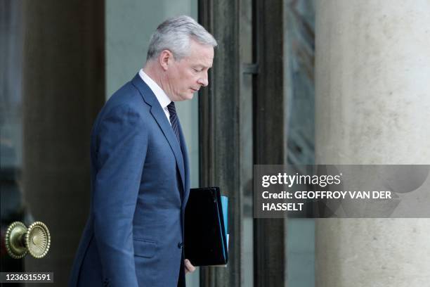 French Economy and Finance Minister Bruno Le Maire reacts as he leaves the Elysee Presidential Palace after a weekly cabinet meeting on November 3,...