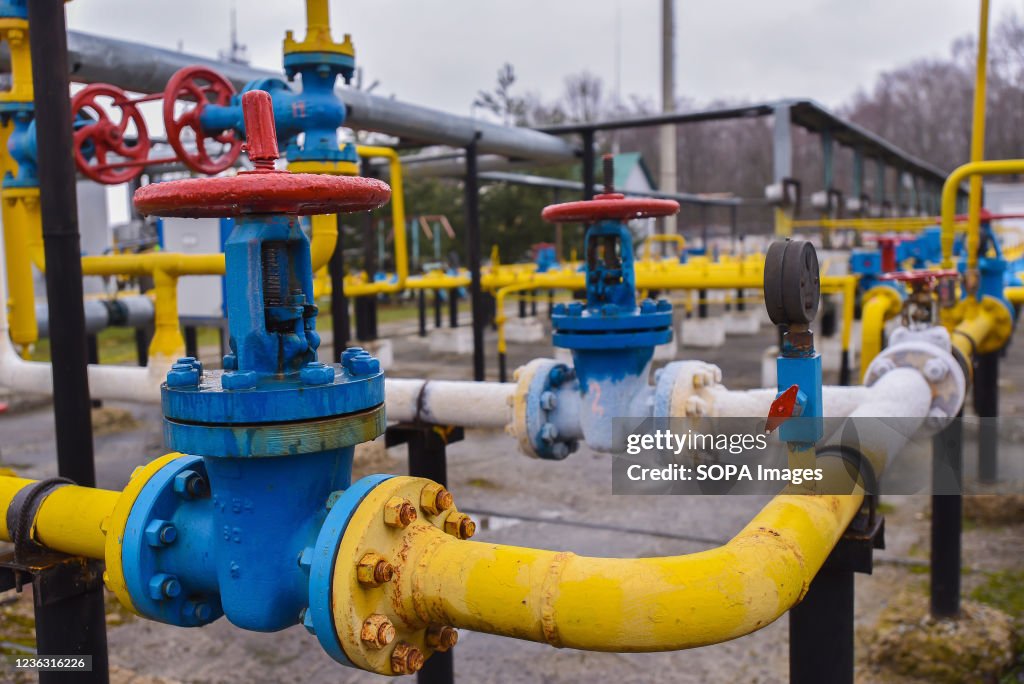 Gas pipes and valves seen at a natural gas station during...