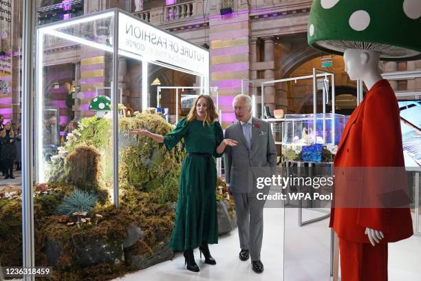 Prince Charles, Prince of Wales speaks to designer Stella McCartney as he views a fashion installation by the designer, at the Kelvingrove Art...