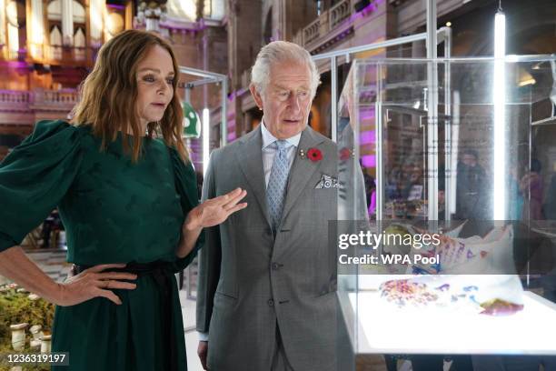 Prince Charles, Prince of Wales speaks to designer Stella McCartney as he views a fashion installation by the designer, at the Kelvingrove Art...