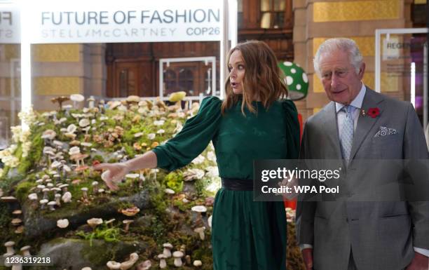 Prince Charles, Prince of Wales speaks to designer and sustainability advocate Stella McCartney as he views a fashion installation by the designer,...
