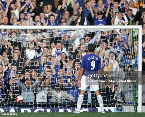 Premiership - Everton v Sheffield United, James Beattie of Everton stands in front of the cheering fans in celebration after scoring a penalty for...