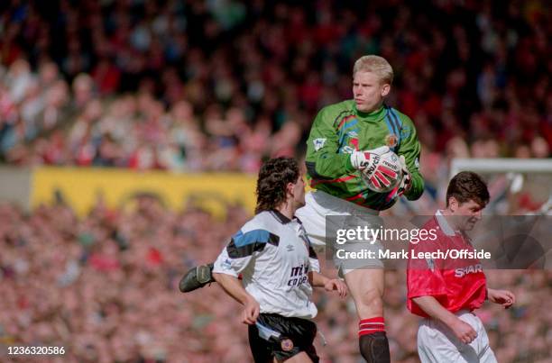 March 1993 Premier League - Manchester United v Aston Villa - United goalkeeper Peter Schmeichel gathers the ball.