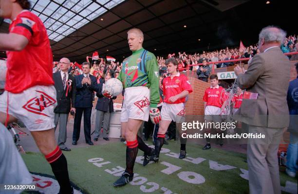 May 1993 Manchester - Premier League - Manchester United v Blackburn Rovers - United players Peter Schmeichel, Mark Hughes and Denis Irwin are...