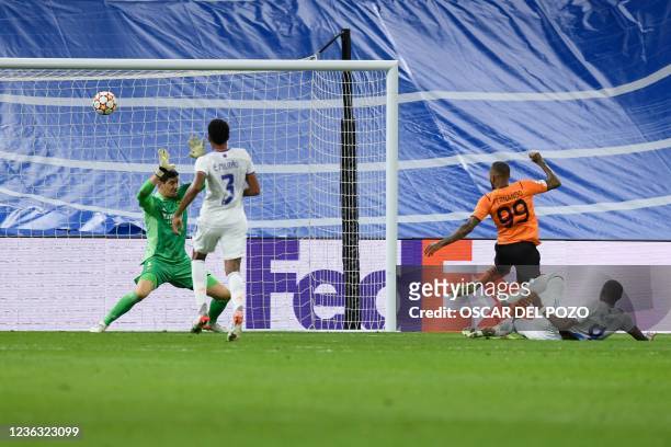 Shakhtar Donetsk's Brazilian forward Fernando Dos Santos Pedro scores his team's first goal during the UEFA Champions League first round group D...