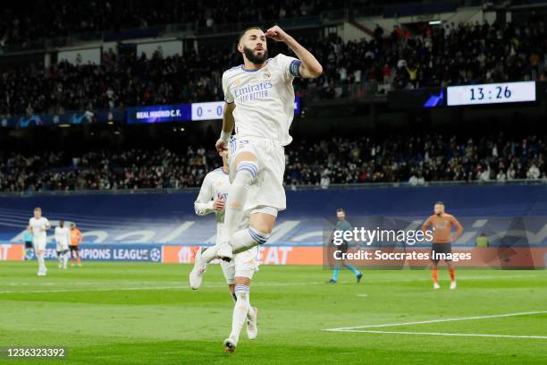 Karim Benzema of Real Madrid celebrates 1-0 during the UEFA Champions League match between Real Madrid v Shakhtar Donetsk at the Estadio Alfredo Di...