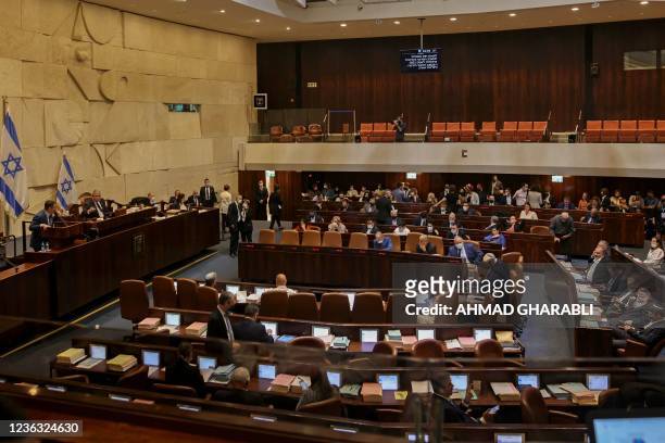 This picture shows a general view of a plenum session and vote on the state budget at the Knesset , in Jerusalem on November 3, 2021.