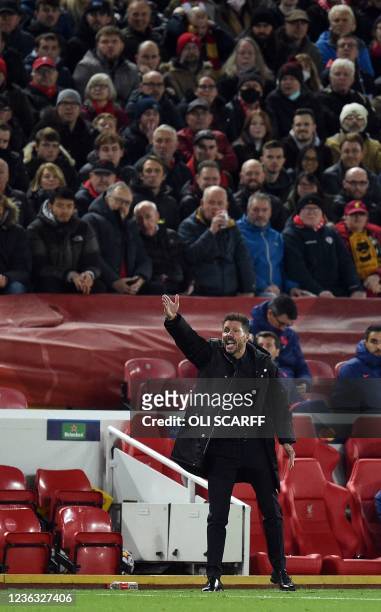 Atletico Madrid's Argentine coach Diego Simeone gestures during the UEFA Champions League group B football match between Liverpool and Atletico...