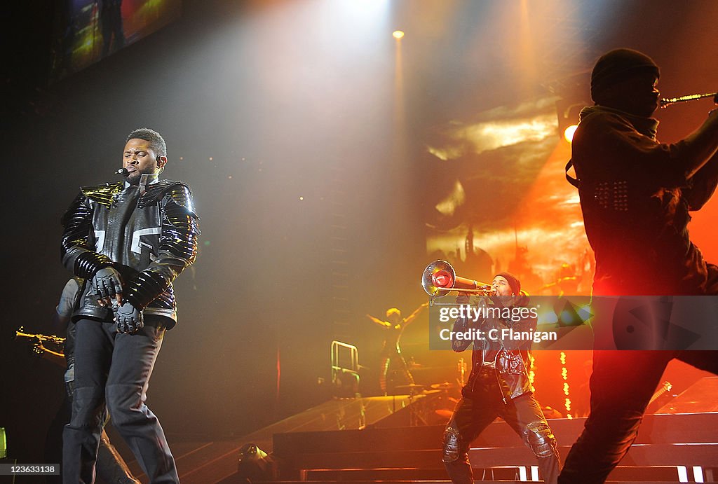 Vocalist Usher performs during his 2010 OMG Tour at ORACLE Arena on
