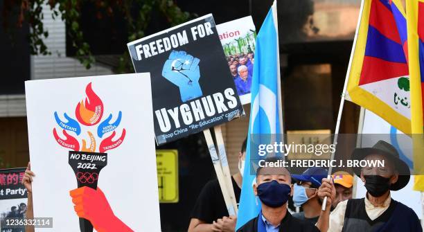 Activists rally in front of the Chinese Consulate in Los Angeles, California on November 3 calling for a boycott of the 2022 Beijing Winter Olympics...