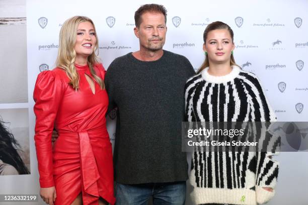 Luna Schweiger, Til Schweiger and Emma Schweiger during the premiere of "Die Rettung der uns bekannten Welt" at Astor Filmlounge on November 3, 2021...