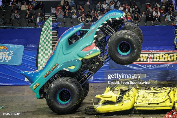 Monster Truck Mega Wrex driven by Ryan Holman doing stunts during Hot Wheels Monster Trucks Live on October 31 at Scope Arena in Norfolk, VA.