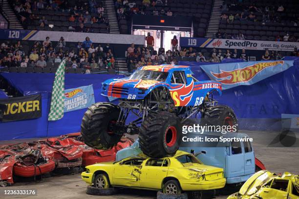 Monster Truck Race Ace driven by Darron Schnell doing stunts during Hot Wheels Monster Trucks Live on October 31 at Scope Arena in Norfolk, VA.