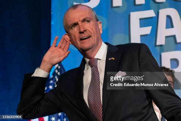 New Jersey Governor Phil Murphy gestures to supporters as he arrives to give a victory speech at Grand Arcade at the Pavilion on November 3, 2021 in...
