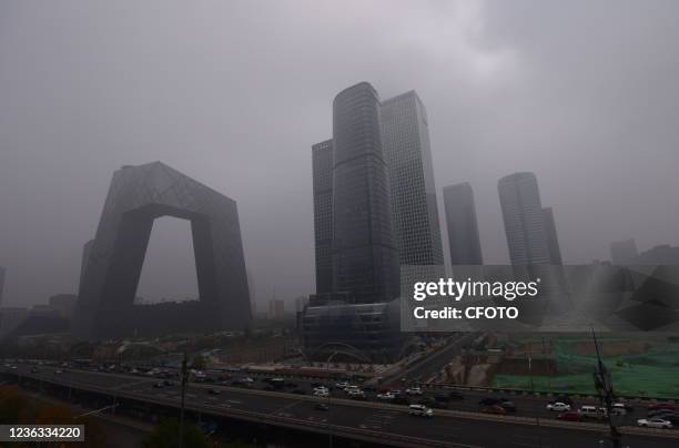 High-rise buildings are shrouded in fog on November 4, 2021 in Beijing, China.