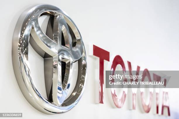 The Toyota logo is seen at a showroom in Tokyo on November 4, 2021.