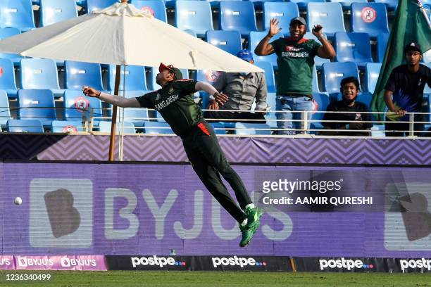 Bangladesh's Soumya Sarkar attempts a catch of Australia's Aaron Finch during the ICC mens Twenty20 World Cup cricket match between Australia and...