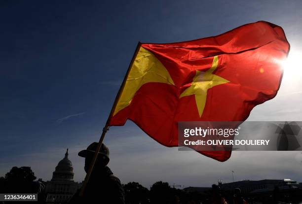 Demonstrators with Tigray flags and posters march on the National Mall in Washington, DC on November 4 marking the one-year anniversary of the...