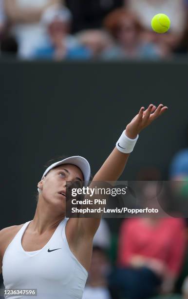 Ana Konjuh of Croatia serves against Caroline Wozniacki of Denmark in the women's singles third round during day five of the 2014 Wimbledon...