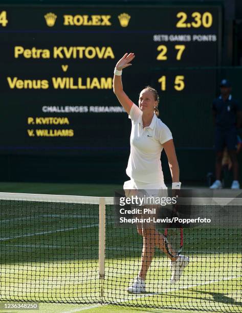 Petra Kvitova of the Czech Republic waves to the crowd after defeating Venus Williams of the United States in the women's singles third round during...