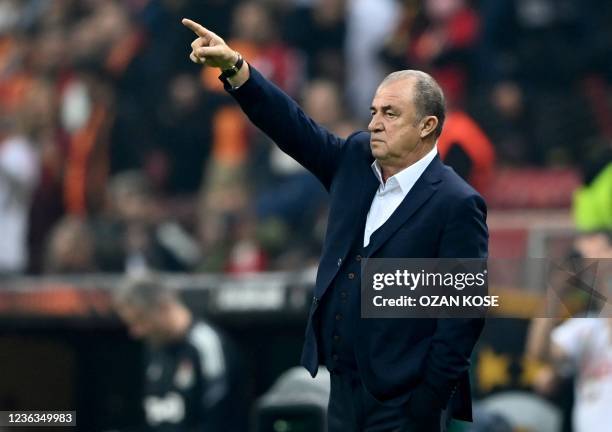 Galatasaray's Turkish head coach Fatih Terim gives instructions to his players during the UEFA Europa League Group E football match between...