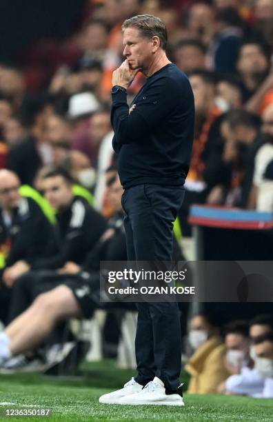 Lokomotiv Moscow's German head coach Markus Gisdol looks at his players during the UEFA Europa League Group E football match between Galatasaray and...