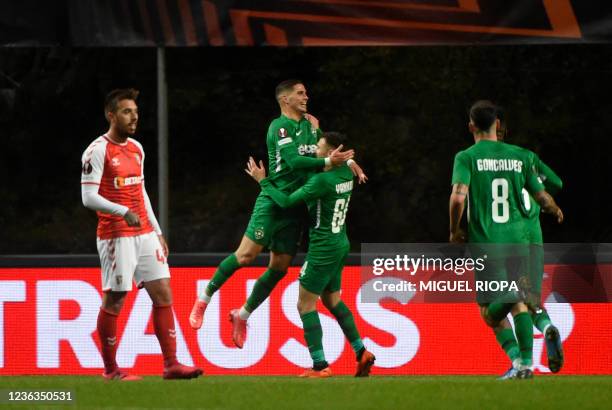 Ludogorets Razgrad's Cyprus' forward Pieros Sotiriou celebrates with teammates after scoring his team's first goal during the UEFA Europa League...