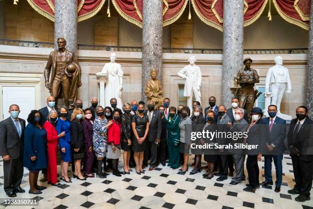 Representative-elect Shontel Brown poses for a photo with Rep. James Clyburn and the Congressional Black Caucus in Statuary Hall at the U.S. Capitol...