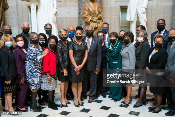 Representative-elect Shontel Brown poses for a photo with Rep. James Clyburn and the Congressional Black Caucus in Statuary Hall at the U.S. Capitol...