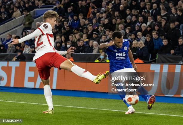 Leicester City's Ryan Bertrand crosses under pressure from Spartak Moscow's Mikhail Ignatov during the UEFA Europa League group C match between...