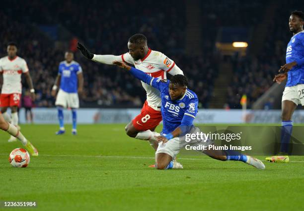 Ademola Lokman of Leicester City is fouled by Victor Moses of Spartak Moscow to win a penalty for Leicester City during the UEFA Europa League group...