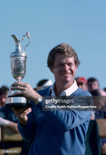 Tom Watson of the United States celebrates with the trophy after winning the Open Championship at Royal Troon Golf Club on July 18, 1982 in Troon,...