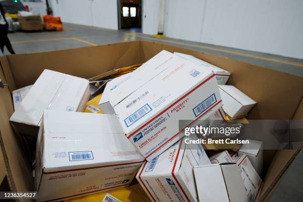 Detail view of USPS test packages used in machine setup during a media tour of a United States Postal Service package support annex on November 4,...