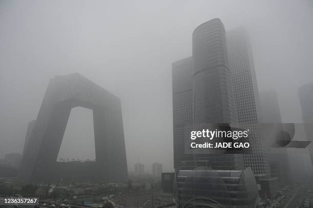 Buildings are seen in the central business district on a polluted day in Beijing on November 5, 2021.