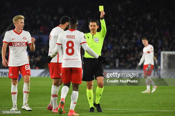 Referee, Halil Umut Meler shows a yellow card for unsporting behaviour to Victor Moses of FC Spartak Moscow during the UEFA Europa League Group C...