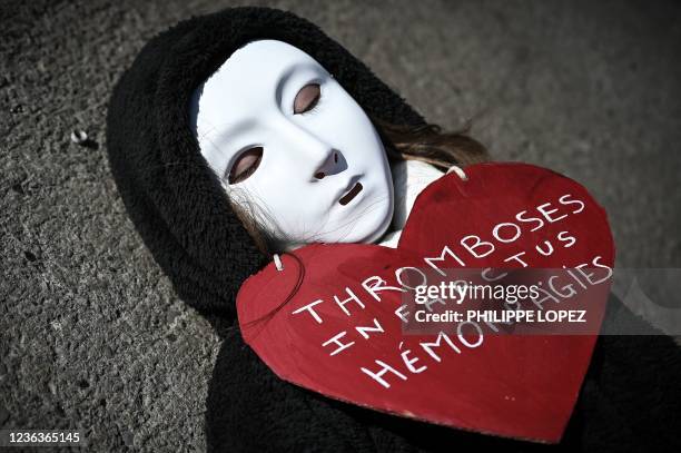 Supporter of French medicine professor Didier Raoult lies on the ground during a hearing Raoult before the disciplinary chamber of the local Medical...