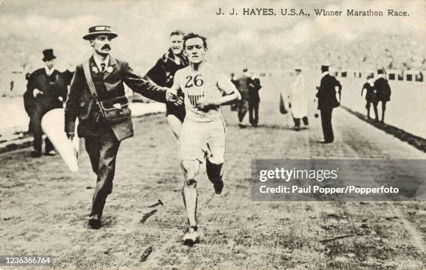 Vintage postcard featuring the American runner Johnny Hayes, the official marathon winner, after the Italian Dorando Pietri was disqualified during...