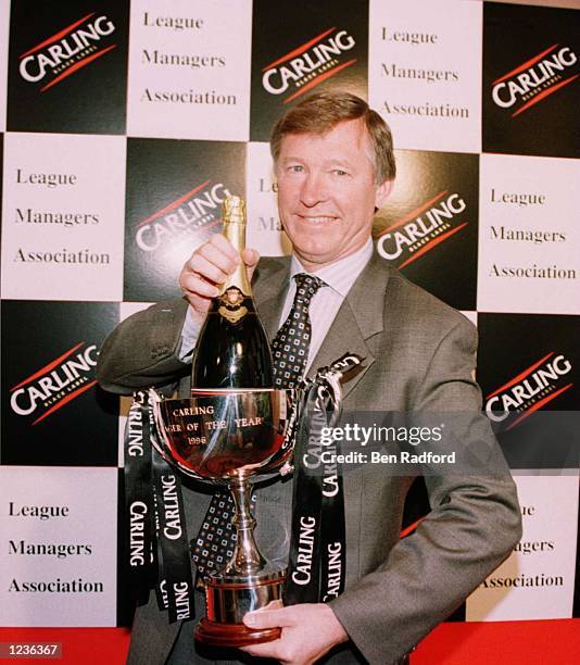Manager Alex Ferguson of Manchester United with the Carling Manager of The Year award during the league managers association manager of the year...